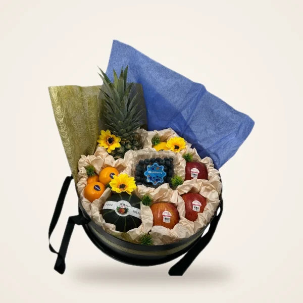 Black Hatbox Pineapple & Sunflower Fruit Basket - pineapple, blueberries, apples and sunflowers in a black hatbox