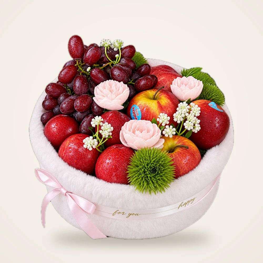 Blush & Bloom Luxury Fruit Hamper - red grapes and apples with pink and white floral accents and a pink satin ribbon