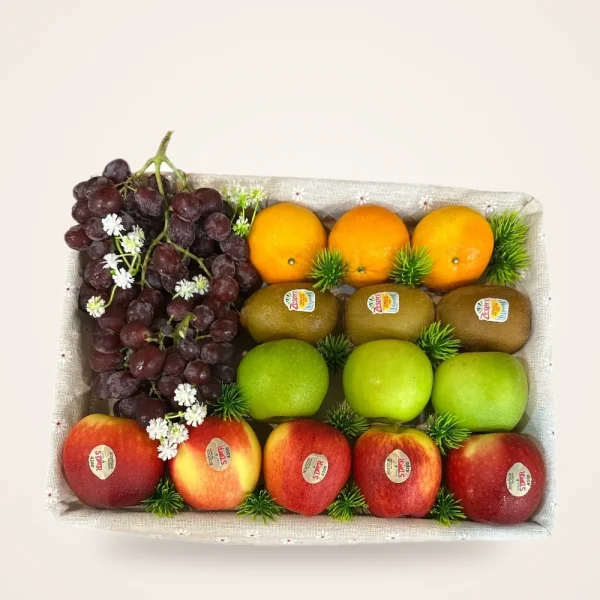 Classic Fruit Tray with Grapes, Oranges & Kiwi - grapes, oranges, kiwi, green and red apples in a linen-lined tray