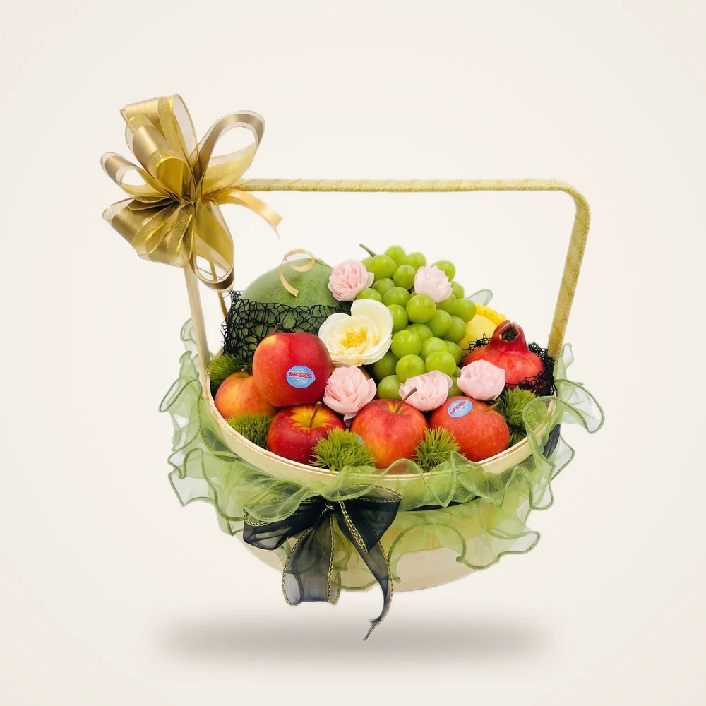 Lantern Festival Fruit Hamper - apples, melon, green grapes, roses and a gold bow in a handle hamper