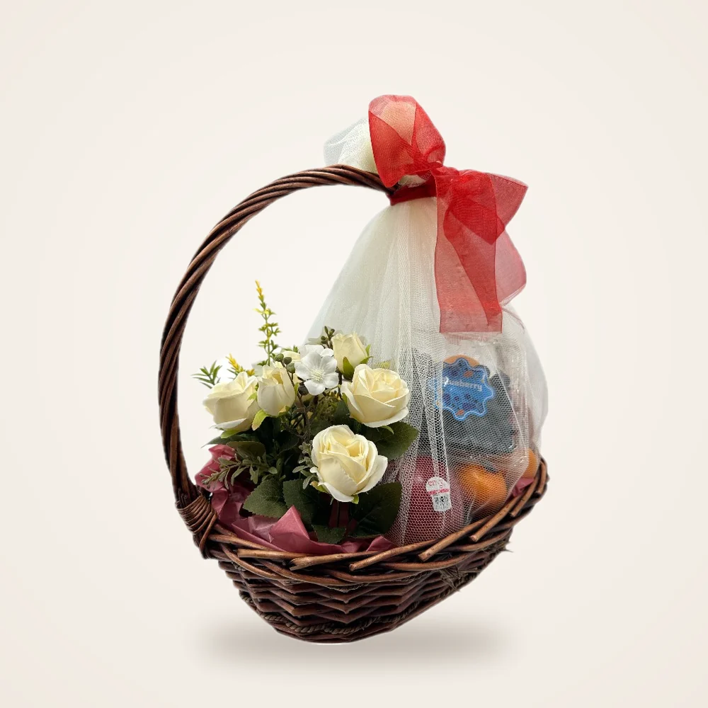 Red Ribbon Rose Fruit Basket - fruit with white roses in a wrapped woven basket with a red ribbon